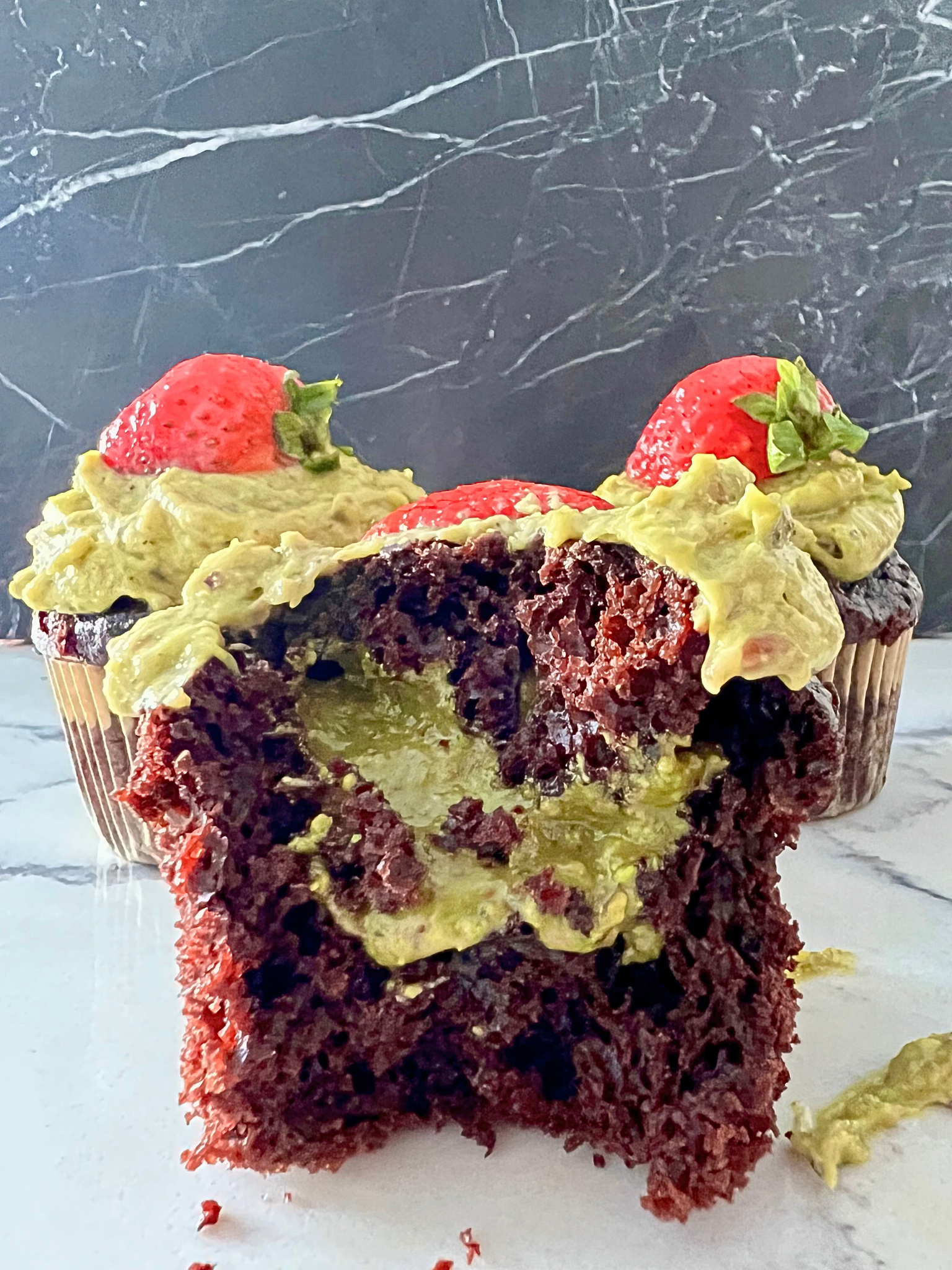 Pistachio Stuffed Chocolate Cupcakes